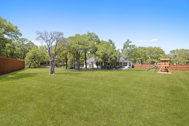 113 Oak Plaza Dr, Georgetown, TX 78628 - view of yard featuring fence and playground community