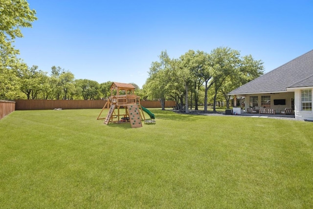 113 Oak Plaza Dr, Georgetown, TX 78628 - view of yard with a playground, a patio area, and fence