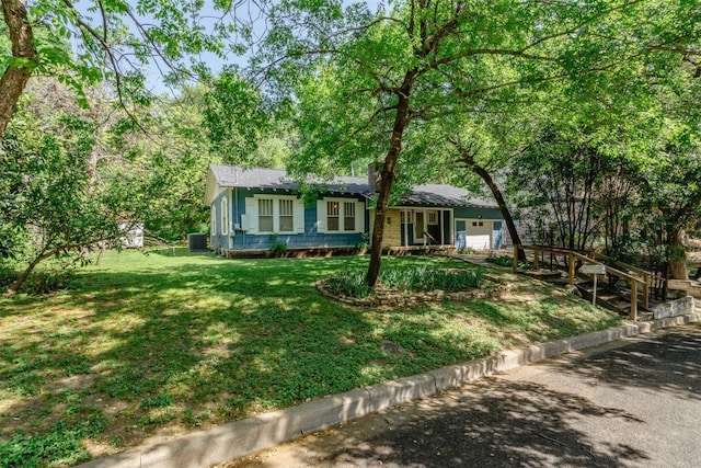 1010 Avondale Rd, Austin, TX 78704 - view of front of house with central AC unit and a front yard