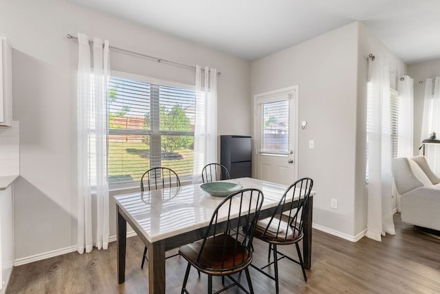 10805 Dimitrios Dr, Austin, TX 78747 - dining area with wood finished floors and baseboards