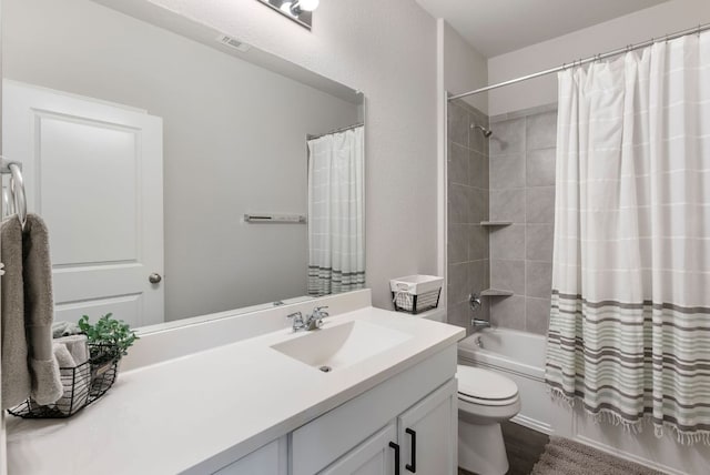 10805 Dimitrios Dr, Austin, TX 78747 - full bathroom with vanity, shower / bathtub combination with curtain, and wood finished floors
