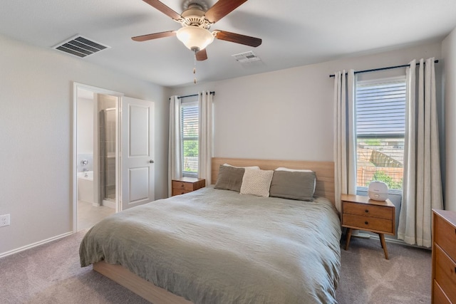 10805 Dimitrios Dr, Austin, TX 78747 - bedroom featuring light colored carpet, ceiling fan, and ensuite bathroom