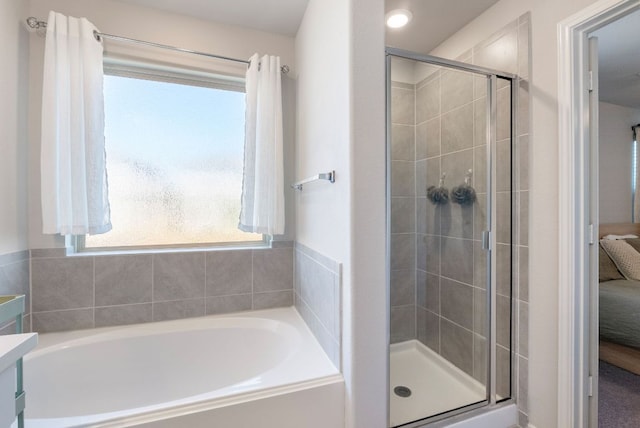 10805 Dimitrios Dr, Austin, TX 78747 - ensuite bathroom with a shower stall, a garden tub, and vanity