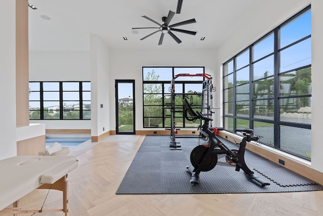 4816 Pecan Chase, Austin, TX 78738 - workout room with a ceiling fan and baseboards