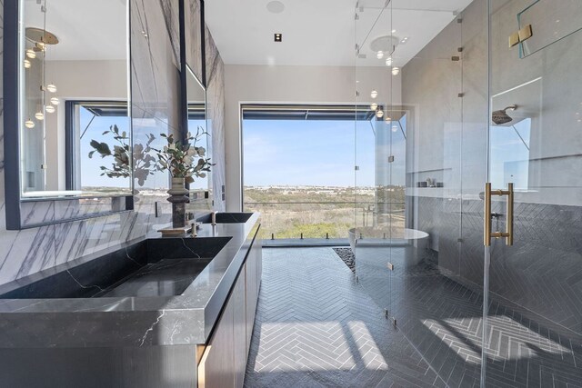 4816 Pecan Chase, Austin, TX 78738 - full bath featuring a stall shower, a freestanding bath, healthy amount of natural light, and vanity
