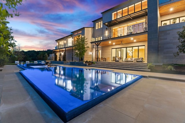 4816 Pecan Chase, Austin, TX 78738 - view of swimming pool with an infinity pool, outdoor lounge area, and a patio