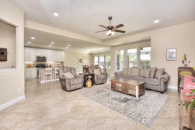 1904 Cactus Mound Dr, Leander, TX 78641 - living area featuring recessed lighting, a ceiling fan, and light tile patterned floors