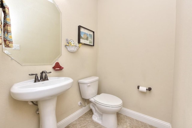 1904 Cactus Mound Dr, Leander, TX 78641 - half bathroom featuring baseboards and tile patterned floors