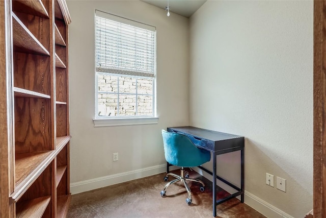 office space featuring baseboards and a healthy amount of sunlight