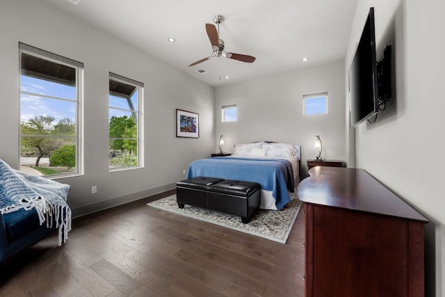 bedroom with ceiling fan, dark wood finished floors, baseboards, visible vents, and recessed lighting
