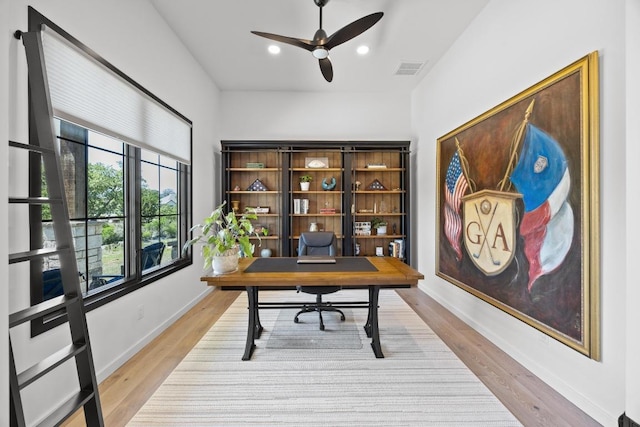 4010 County Road 404, Spicewood, TX 78669 - office featuring ceiling fan, light wood-style floors, baseboards, and recessed lighting
