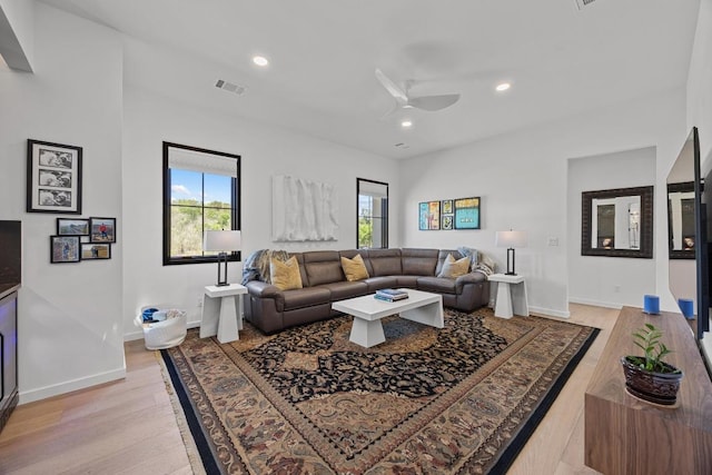 4010 County Road 404, Spicewood, TX 78669 - living area with light wood-style floors, baseboards, recessed lighting, and ceiling fan