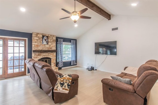 2400 Braemar Cv, Austin, TX 78747 - living area with light wood-style flooring, ceiling fan, recessed lighting, and a fireplace