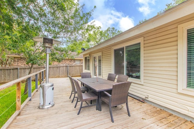 2400 Braemar Cv, Austin, TX 78747 - wooden terrace with outdoor dining space