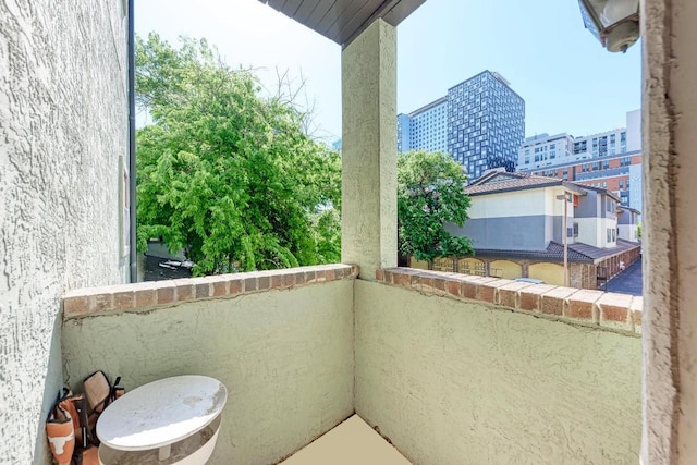 balcony featuring a city view