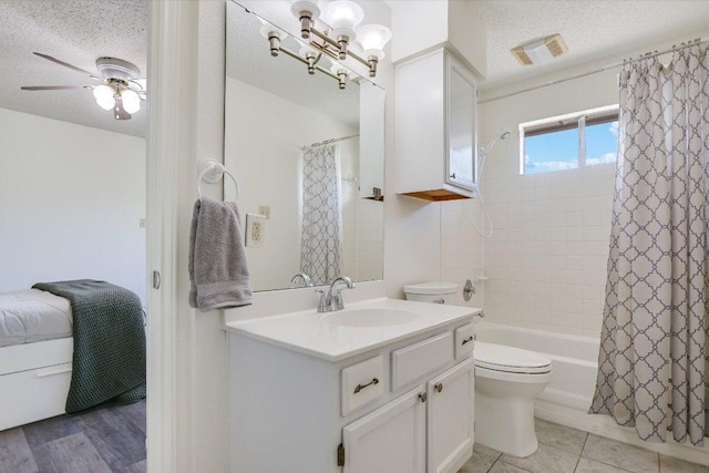 7809 Taranto Dr, Austin, TX 78729 - full bathroom featuring a textured ceiling, vanity, shower / tub combo with curtain, and a ceiling fan