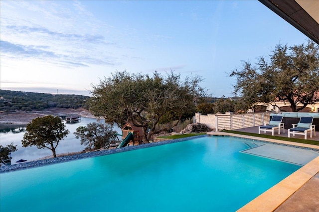 821 S Angel Light Dr, Spicewood, TX 78669 - view of swimming pool with a water view