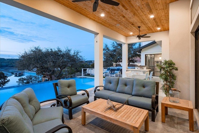 821 S Angel Light Dr, Spicewood, TX 78669 - view of patio with ceiling fan, an outdoor hangout area, and an outdoor pool