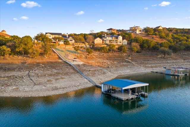 821 S Angel Light Dr, Spicewood, TX 78669 - dock area featuring a water view and boat lift
