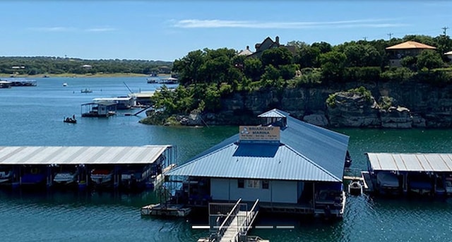 view of dock featuring a water view and boat lift