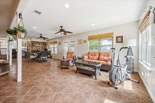 59 Fairview Dr, Round Rock, TX 78665 - tiled living room featuring healthy amount of natural light, recessed lighting, and a ceiling fan