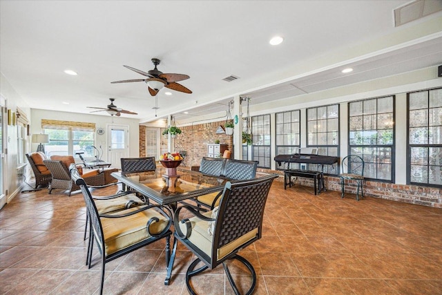 59 Fairview Dr, Round Rock, TX 78665 - tiled dining space featuring brick wall, recessed lighting, and ceiling fan