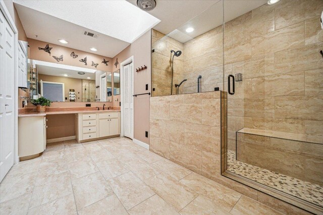 59 Fairview Dr, Round Rock, TX 78665 - full bath with a stall shower, vanity, and recessed lighting