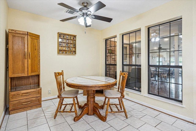 59 Fairview Dr, Round Rock, TX 78665 - dining space featuring ceiling fan, light tile patterned floors, and plenty of natural light