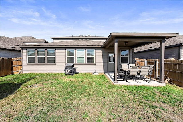 365 Capstone Rd, Liberty Hill, TX 78642 - rear view of house featuring a patio area, a fenced backyard, a shingled roof, and a lawn