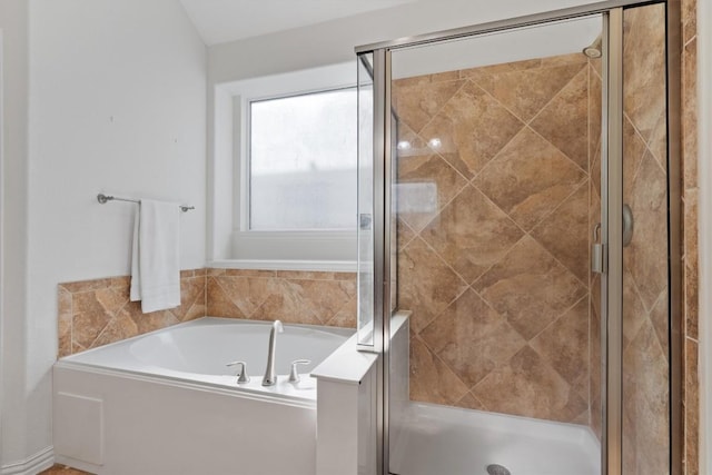 2529 Mirasol Loop, Round Rock, TX 78681 - bathroom featuring a garden tub and a shower stall
