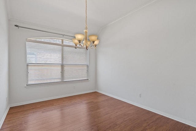 2529 Mirasol Loop, Round Rock, TX 78681 - empty room with a chandelier, ornamental molding, wood finished floors, and baseboards