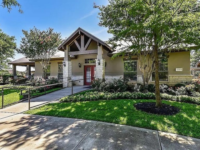 2529 Mirasol Loop, Round Rock, TX 78681 - craftsman house featuring stucco siding and stone siding