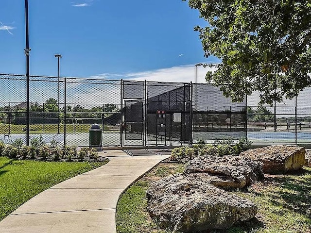 2529 Mirasol Loop, Round Rock, TX 78681 - view of tennis court featuring a gate