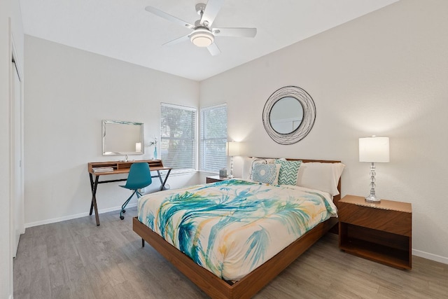 21726 Sierra Trl, Lago Vista, TX 78645 - bedroom featuring wood finished floors, baseboards, and ceiling fan