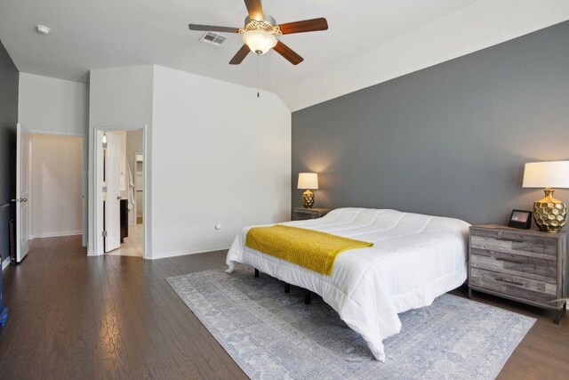 bedroom featuring vaulted ceiling, a ceiling fan, wood finished floors, baseboards, and visible vents