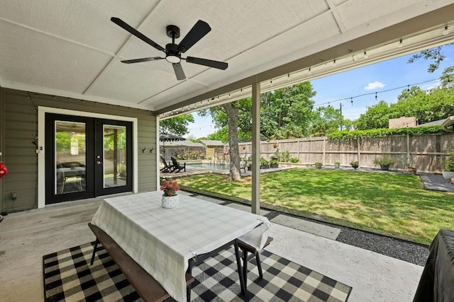 1403 E 16th St, Georgetown, TX 78626 - view of patio / terrace featuring french doors, a ceiling fan, and outdoor dining space