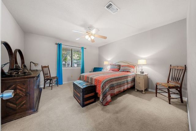 8200 Neely Dr Unit 217, Austin, TX 78759 - carpeted bedroom with baseboards and a ceiling fan