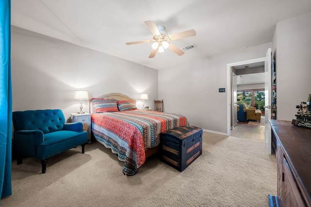 8200 Neely Dr Unit 217, Austin, TX 78759 - bedroom featuring light carpet, ceiling fan, and baseboards