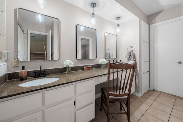 8200 Neely Dr Unit 217, Austin, TX 78759 - full bath featuring double vanity and tile patterned flooring