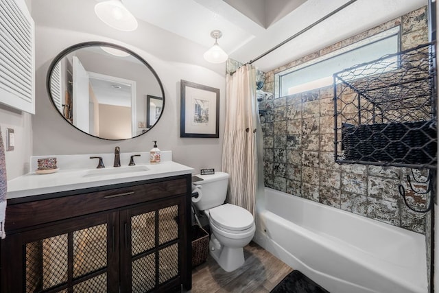 8200 Neely Dr Unit 217, Austin, TX 78759 - full bath featuring wood finished floors, toilet, vanity, and shower / bathtub combination with curtain