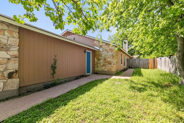 exterior space with a fenced backyard