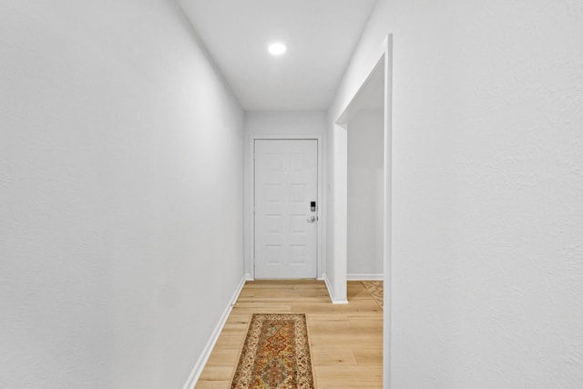 607 Elderberry Cv, Austin, TX 78745 - corridor with light wood-type flooring, baseboards, and recessed lighting