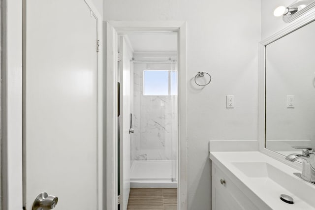 607 Elderberry Cv, Austin, TX 78745 - full bath featuring a marble finish shower and vanity