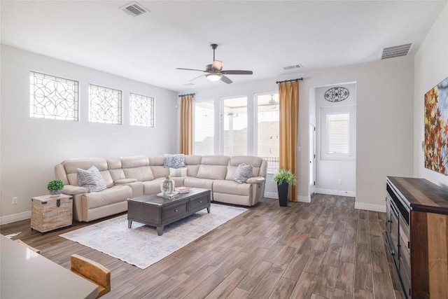 505 Saturnia Dr, Georgetown, TX 78628 - living area with ceiling fan and dark wood-style flooring
