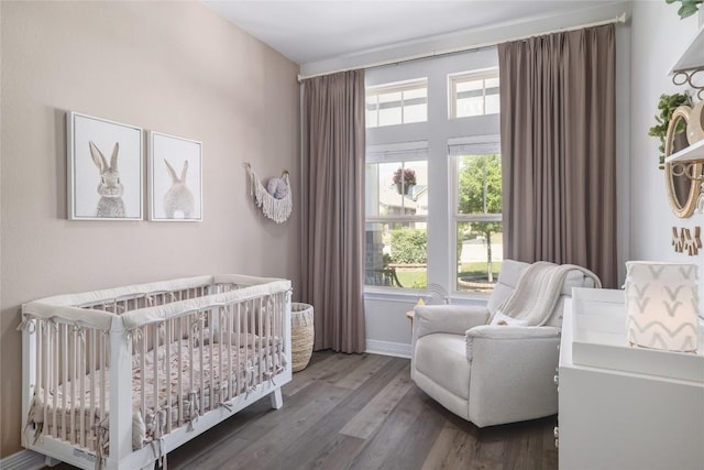505 Saturnia Dr, Georgetown, TX 78628 - bedroom with wood finished floors and a nursery area