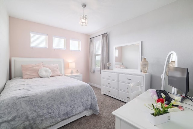 505 Saturnia Dr, Georgetown, TX 78628 - bedroom featuring light colored carpet and baseboards