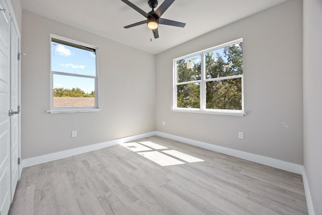 7 Harmony Ln, Wimberley, TX 78676 - spare room with ceiling fan and wood finished floors