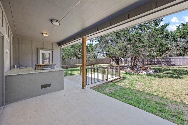 7 Harmony Ln, Wimberley, TX 78676 - fenced backyard with a patio area