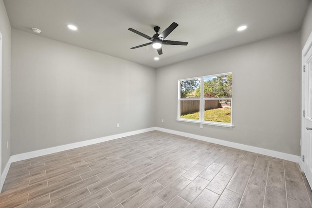 7 Harmony Ln, Wimberley, TX 78676 - empty room with wood finished floors, ceiling fan, a smoke detector, and recessed lighting