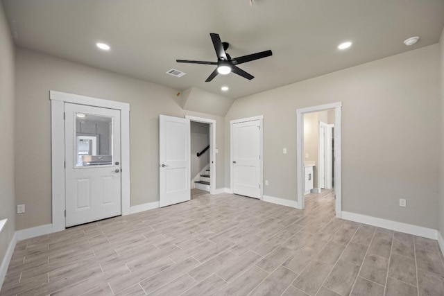 7 Harmony Ln, Wimberley, TX 78676 - unfurnished bedroom with light wood finished floors, recessed lighting, and ceiling fan